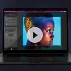 Photo of a Macbook showing the Ephoto Dam interface. On the image, there's a player right in the middle.